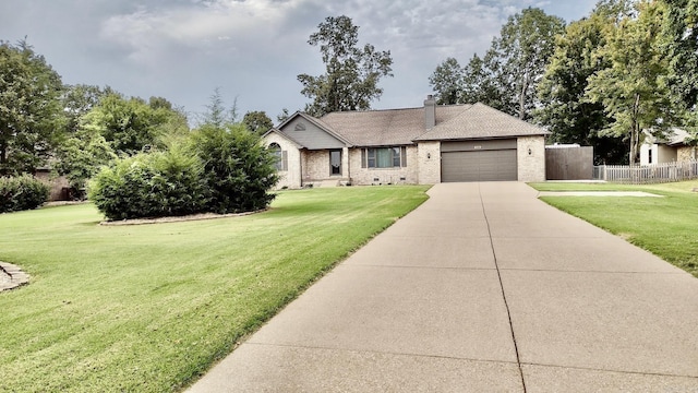 single story home with brick siding, concrete driveway, an attached garage, and a chimney