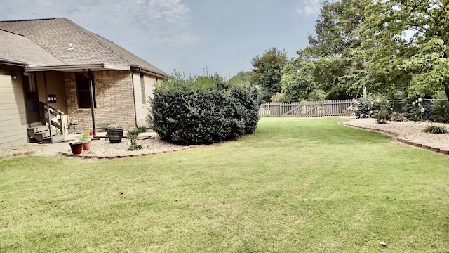 view of yard featuring entry steps