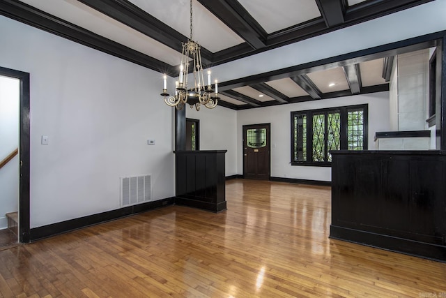 2108 Beechwood, Little Rock, AR 72207 - unfurnished dining area with hardwood / wood-style flooring, a chandelier, beamed ceiling, baseboards, and coffered ceiling
