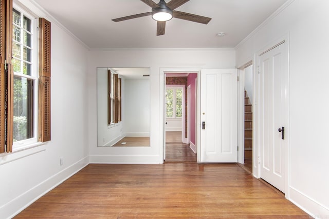2108 Beechwood, Little Rock, AR 72207 - unfurnished bedroom with light wood finished floors, crown molding, baseboards, and a ceiling fan