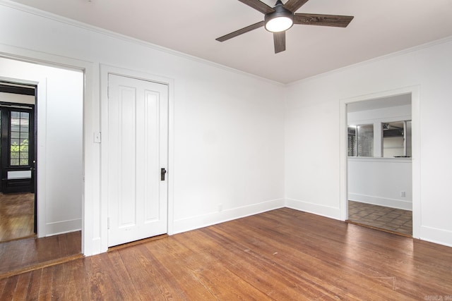 2108 Beechwood, Little Rock, AR 72207 - unfurnished bedroom with wood finished floors, crown molding, baseboards, and ceiling fan