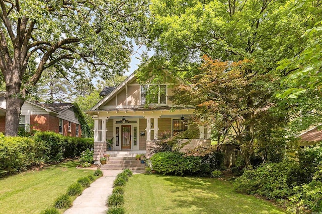 121 N Woodrow St, Little Rock, AR 72205 - craftsman-style home with ceiling fan, a front lawn, and a porch