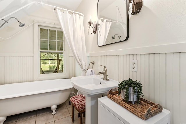 121 N Woodrow St, Little Rock, AR 72205 - full bathroom featuring tile patterned flooring, a freestanding bath, and a wainscoted wall