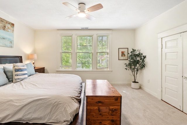121 N Woodrow St, Little Rock, AR 72205 - carpeted bedroom with crown molding, baseboards, and ceiling fan