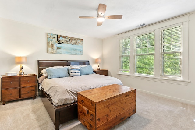 121 N Woodrow St, Little Rock, AR 72205 - bedroom with light carpet, baseboards, and a ceiling fan