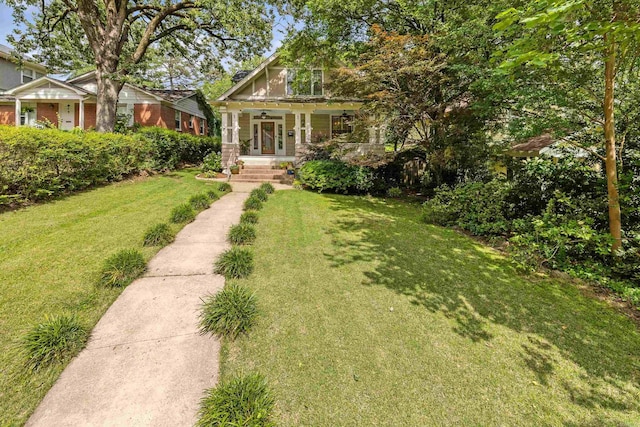 121 N Woodrow St, Little Rock, AR 72205 - view of front of home with a front lawn and a porch