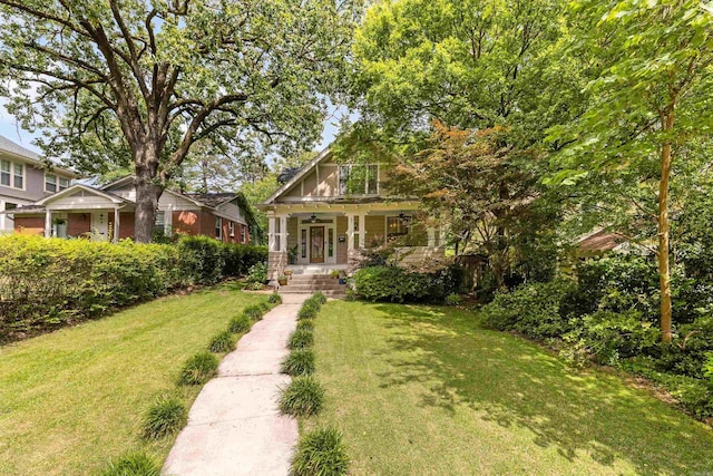 121 N Woodrow St, Little Rock, AR 72205 - view of front of property with covered porch and a front yard