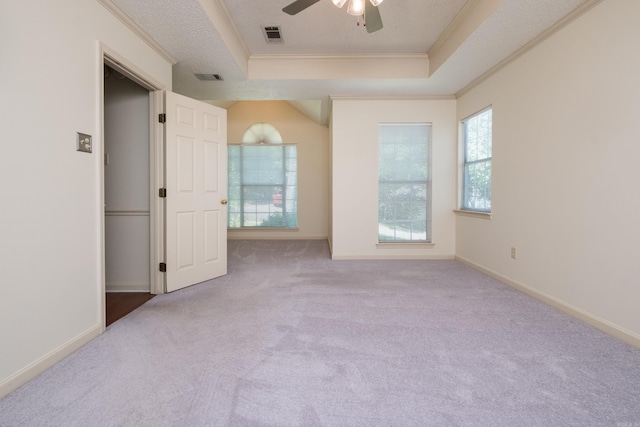 1505 Cherry Brook Dr, Little Rock, AR 72211 - empty room with a tray ceiling, ornamental molding, a ceiling fan, carpet floors, and baseboards