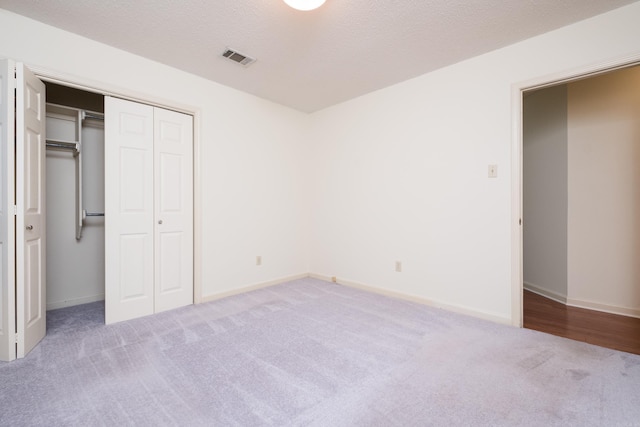 1505 Cherry Brook Dr, Little Rock, AR 72211 - unfurnished bedroom featuring carpet flooring, a closet, and baseboards