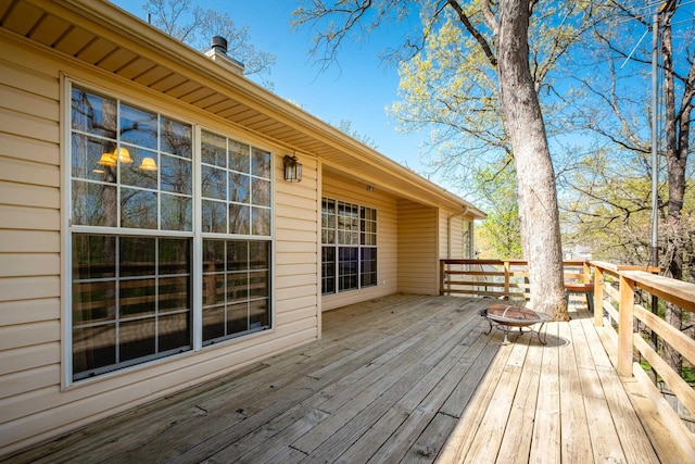 1505 Cherry Brook Dr, Little Rock, AR 72211 - wooden deck with a fire pit