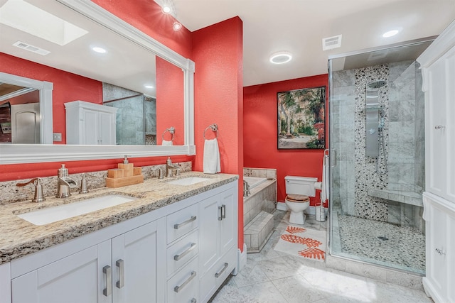77 Stoneledge Dr, Maumelle, AR 72113 - full bath featuring a shower stall, double vanity, a garden tub, toilet, and recessed lighting