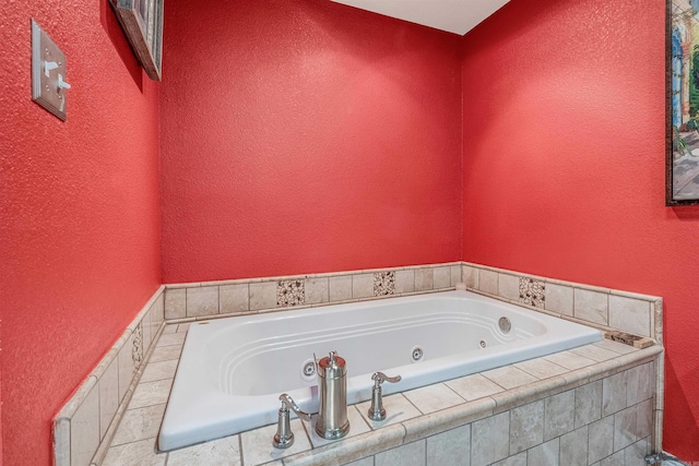 77 Stoneledge Dr, Maumelle, AR 72113 - bathroom with a jetted tub and a textured wall