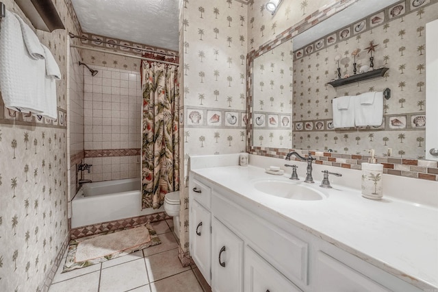 77 Stoneledge Dr, Maumelle, AR 72113 - full bathroom featuring wallpapered walls, toilet, shower / bath combo with shower curtain, tile patterned floors, and vanity