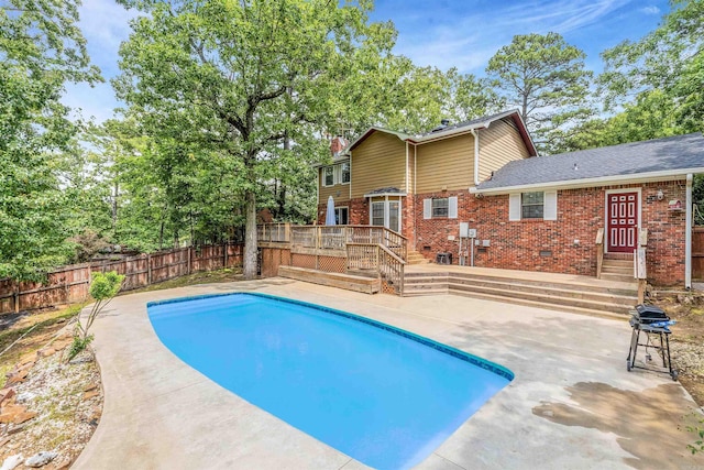 77 Stoneledge Dr, Maumelle, AR 72113 - view of pool with a wooden deck and a patio