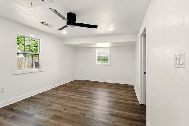 13512 Peters Rd, Cabot, AR 72023 - unfurnished room with wood finished floors, ceiling fan, a textured ceiling, and baseboards