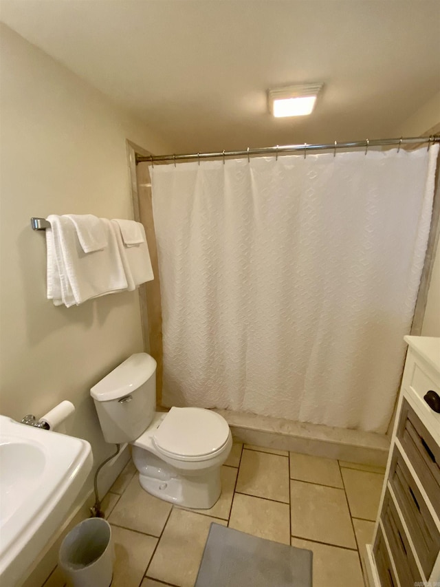 816 N Polk, Little Rock, AR 72205 - bathroom with toilet and tile patterned floors