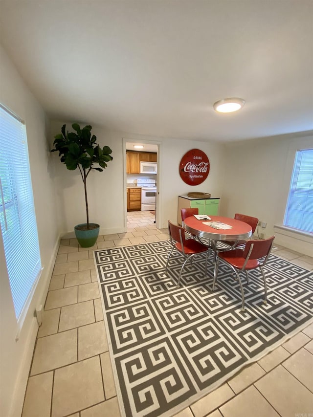816 N Polk, Little Rock, AR 72205 - dining space featuring light tile patterned floors and baseboards