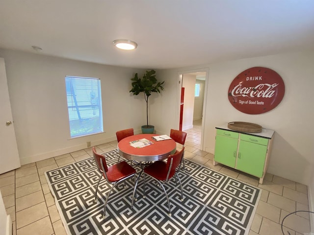 816 N Polk, Little Rock, AR 72205 - dining space featuring light tile patterned flooring and plenty of natural light