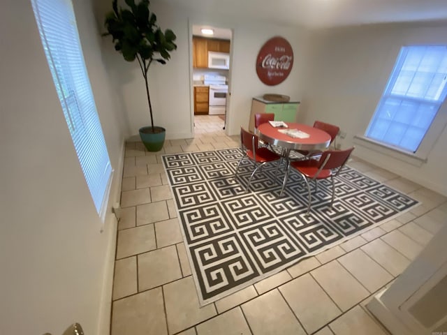 816 N Polk, Little Rock, AR 72205 - dining space featuring light tile patterned floors and healthy amount of natural light