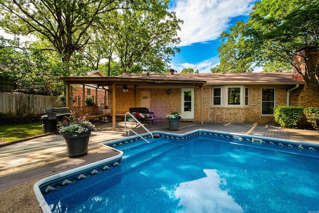 1312 Winnebago Dr, North Little Rock, AR 72116 - view of pool featuring a wooden deck