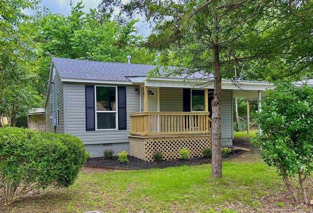1307 Aplin Ave, Perryville, AR 72126 - view of front of property featuring covered porch, roof with shingles, crawl space, and a front yard