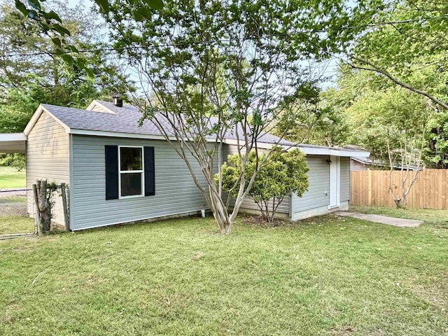 1307 Aplin Ave, Perryville, AR 72126 - rear view of house featuring roof with shingles