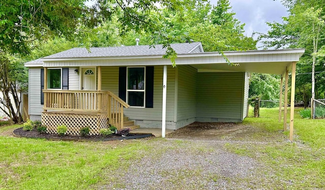 1307 Aplin Ave, Perryville, AR 72126 - view of front of house featuring crawl space, dirt driveway, a carport, roof with shingles, and a porch