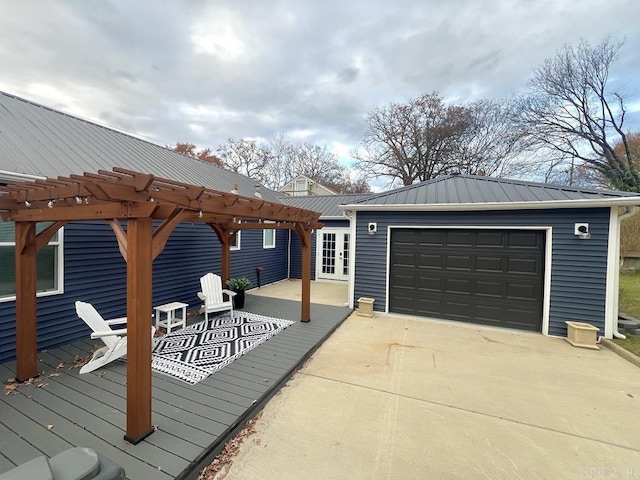 1701 N University, Little Rock, AR 72207 - wooden deck with a pergola and concrete driveway
