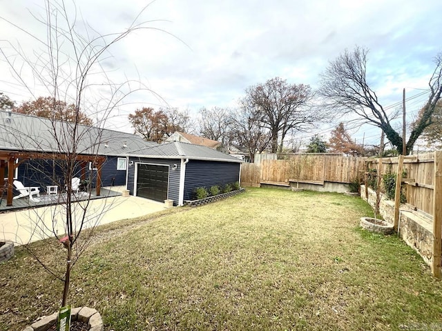 1701 N University, Little Rock, AR 72207 - view of yard featuring driveway and a garage