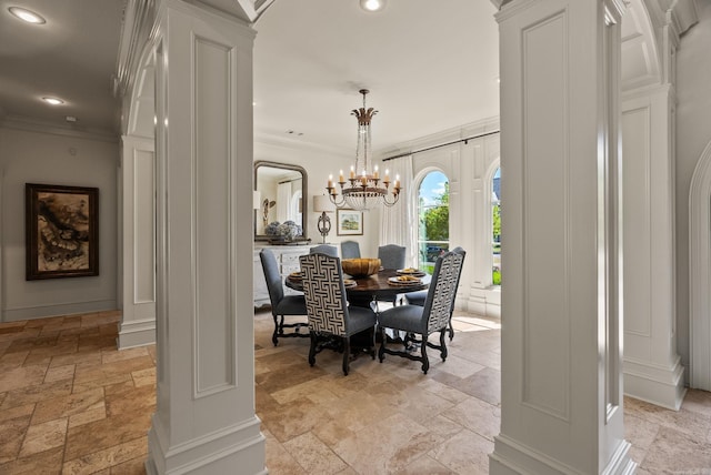 64 Sologne Cir, Little Rock, AR 72223 - dining area with stone tile flooring, crown molding, ornate columns, recessed lighting, and a chandelier