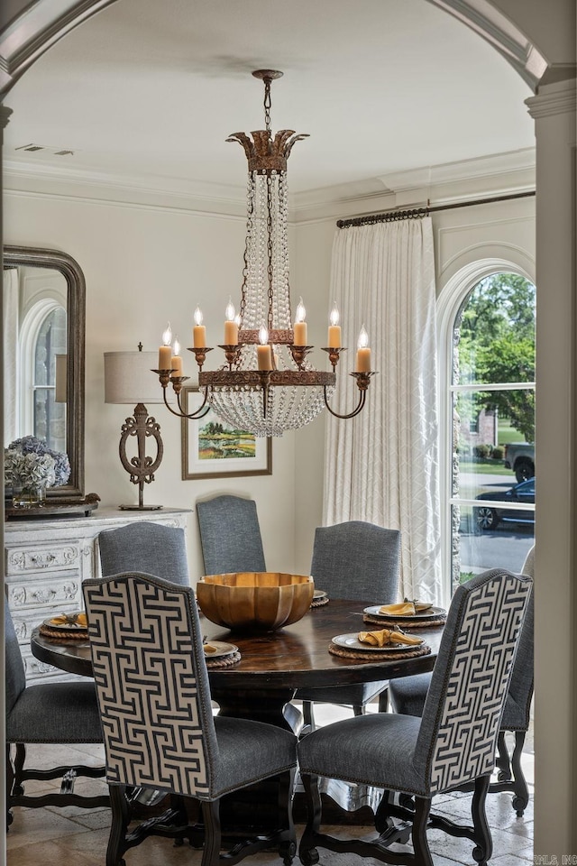 64 Sologne Cir, Little Rock, AR 72223 - dining space featuring ornamental molding, a chandelier, arched walkways, and ornate columns
