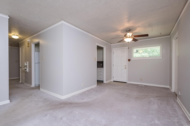 25 Barbara Cir, Little Rock, AR 72204 - empty room featuring ceiling fan, light colored carpet, crown molding, a textured ceiling, and baseboards