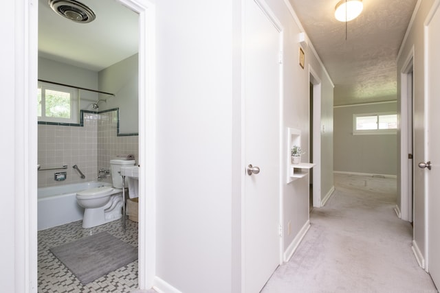 25 Barbara Cir, Little Rock, AR 72204 - corridor featuring a textured ceiling