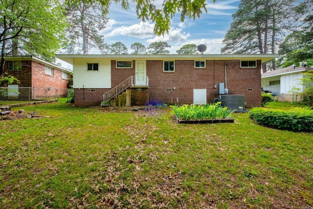25 Barbara Cir, Little Rock, AR 72204 - back of property featuring central AC unit and brick siding