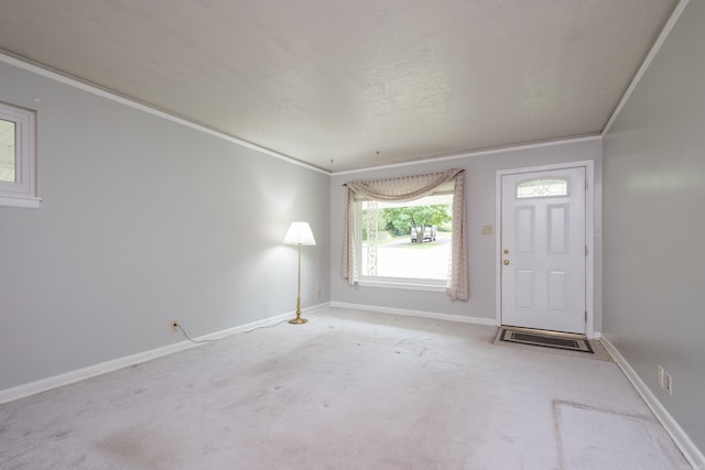 25 Barbara Cir, Little Rock, AR 72204 - foyer featuring ornamental molding, baseboards, and carpet flooring