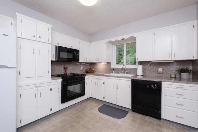 25 Barbara Cir, Little Rock, AR 72204 - kitchen featuring black appliances, a sink, a textured ceiling, white cabinetry, and decorative backsplash