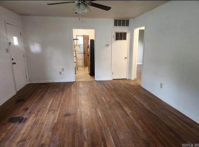 104 W Searcy, Searcy, AR 72082 - unfurnished room featuring ceiling fan, hardwood / wood-style floors, and baseboards