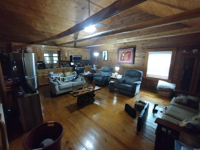 living area with dark wood finished floors and wooden ceiling
