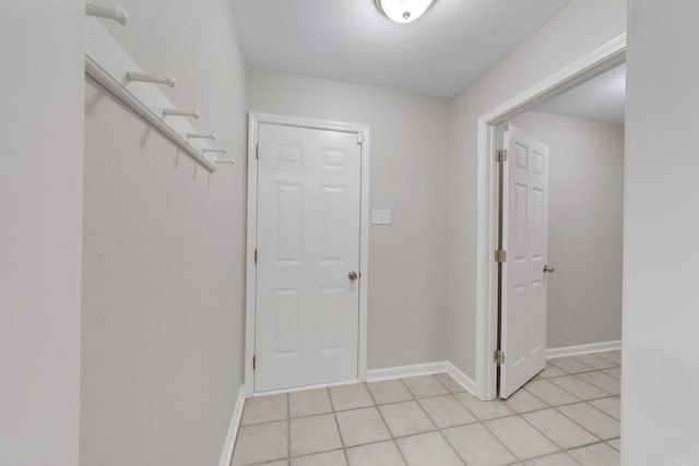 14 Woodbridge, Cabot, AR 72023 - hall featuring light tile patterned floors and baseboards