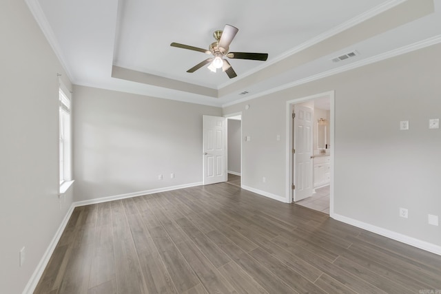 14 Woodbridge, Cabot, AR 72023 - unfurnished room featuring ceiling fan, a raised ceiling, wood finished floors, baseboards, and crown molding