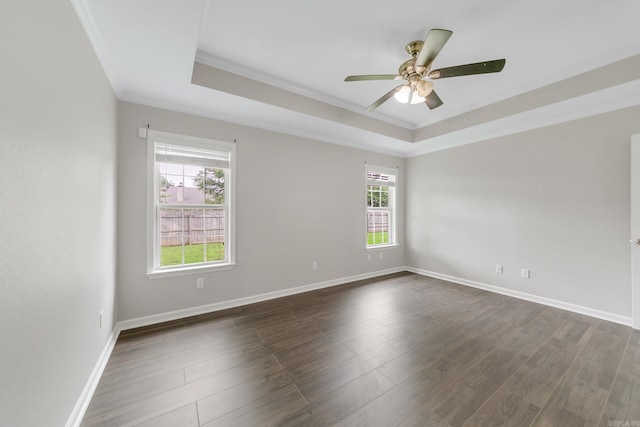 14 Woodbridge, Cabot, AR 72023 - unfurnished room with ornamental molding, a raised ceiling, a ceiling fan, and dark wood-style flooring