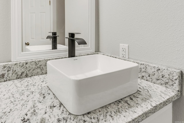 14 Woodbridge, Cabot, AR 72023 - bathroom view of a sink and a textured wall
