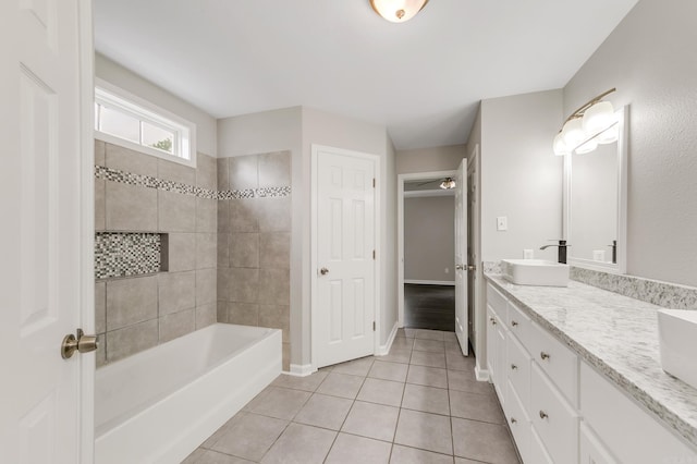 14 Woodbridge, Cabot, AR 72023 - full bathroom with tile patterned floors, double vanity, shower / tub combination, and baseboards