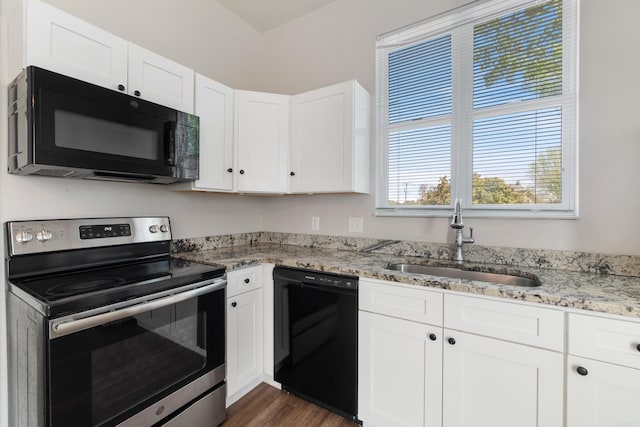1403 Scott, Conway, AR 72032 - kitchen with black appliances, a sink, white cabinets, light stone countertops, and dark wood-style floors