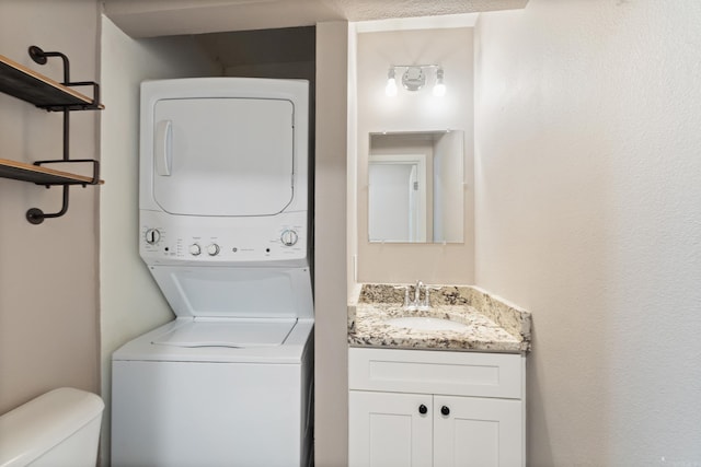 1403 Scott, Conway, AR 72032 - laundry room with stacked washer / drying machine