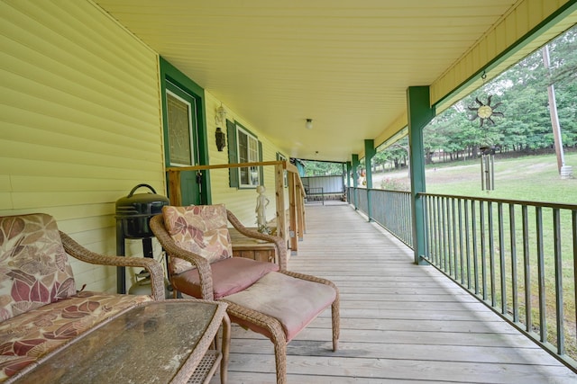 1702 Carolina Dr, Mena, AR 71953 - view of wooden porch