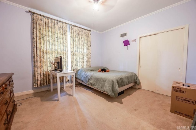 327 N Holloway Ave, El Dorado, AR 71730 - carpeted bedroom featuring crown molding, a ceiling fan, and baseboards