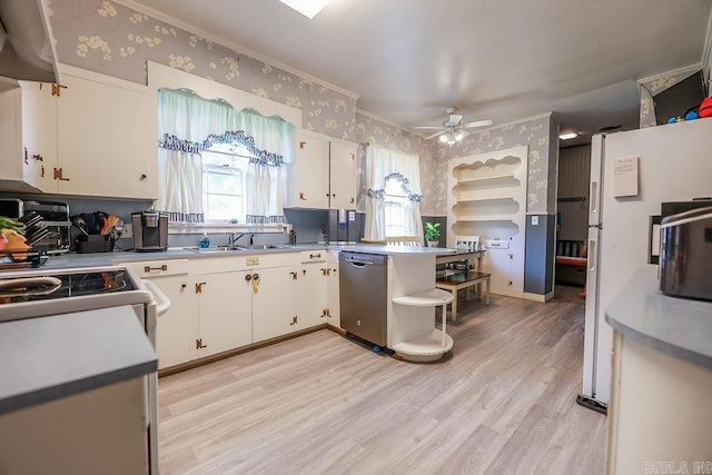 327 N Holloway Ave, El Dorado, AR 71730 - kitchen featuring wallpapered walls, stainless steel dishwasher, a sink, white cabinets, and light wood finished floors