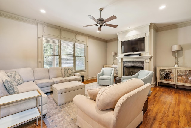 4 Bellegarde Dr, Little Rock, AR 72223 - living room with a ceiling fan, crown molding, a premium fireplace, wood finished floors, and recessed lighting