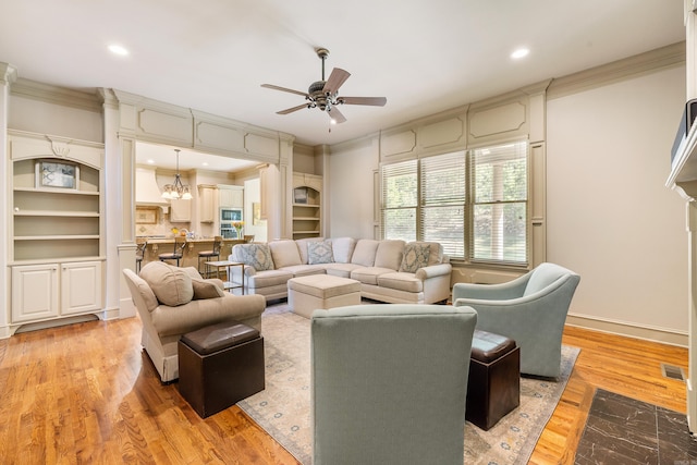 4 Bellegarde Dr, Little Rock, AR 72223 - living area with a ceiling fan, ornamental molding, recessed lighting, light wood-style floors, and baseboards